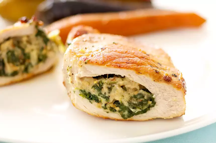 Spinach, Mozzarella and Pine Nuts Stuffed Pork Chops