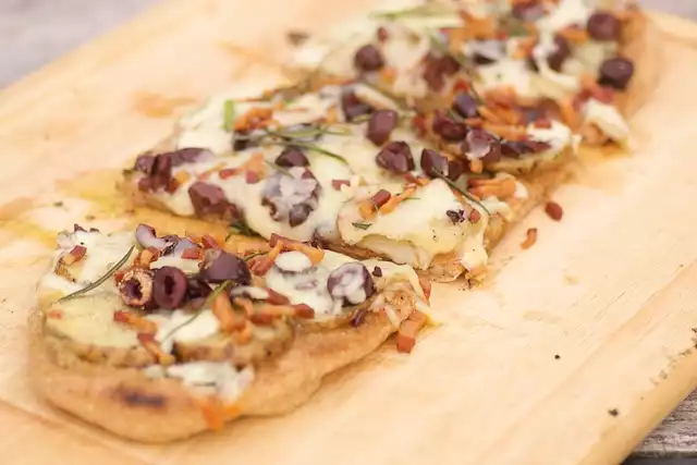 Grilled Potato, Pancetta and Roasted Garlic Pizza with Olives and Rosemary
