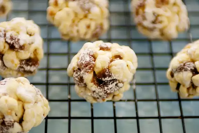 Rum and Raisin Christmas Popcorn Balls 